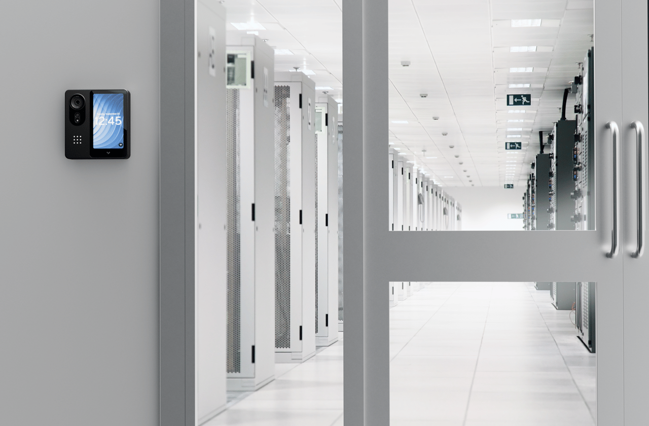 Verkada access control panel mounted beside a secure data center door entrance.