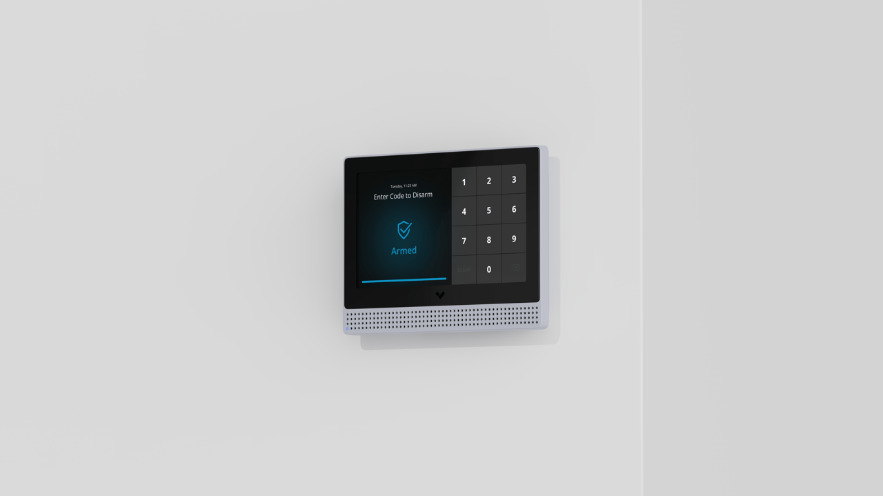 Verkada alarm keypad panel mounted on a white wall showing Armed status.