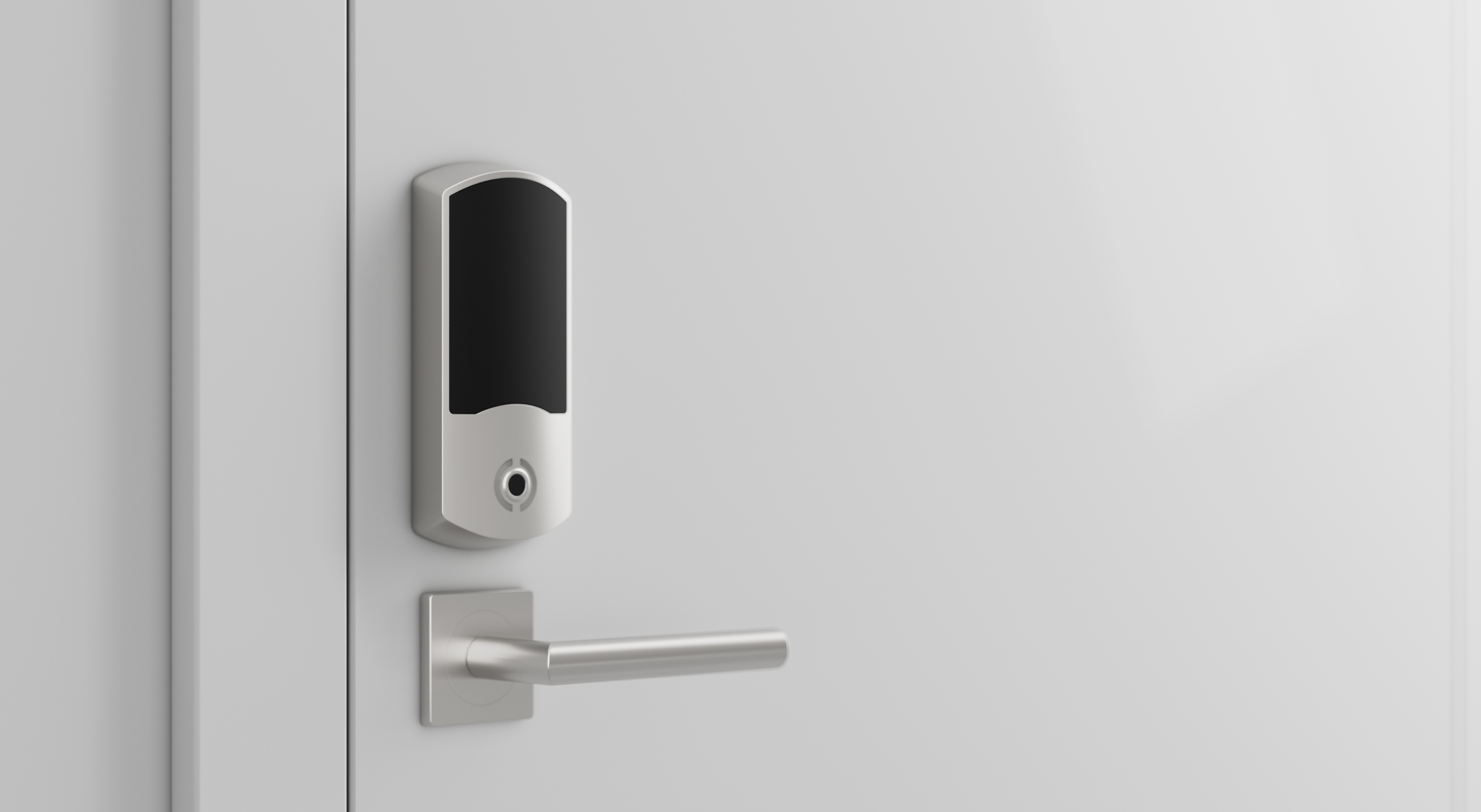 A modern electronic keycard reader and lever door handle mounted on a white door.