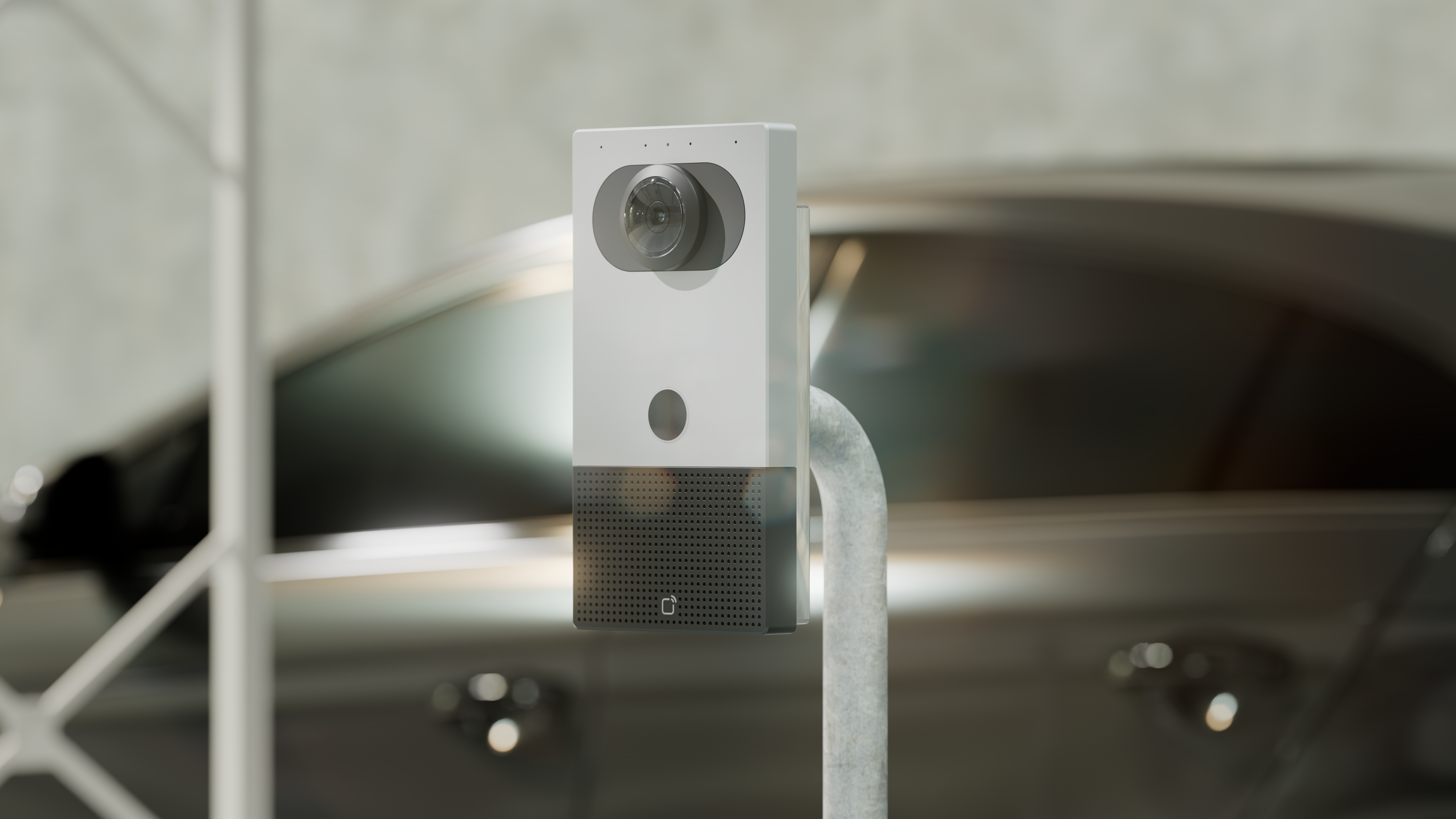 Verkada intercom device mounted on a pole in a parking garage setting.